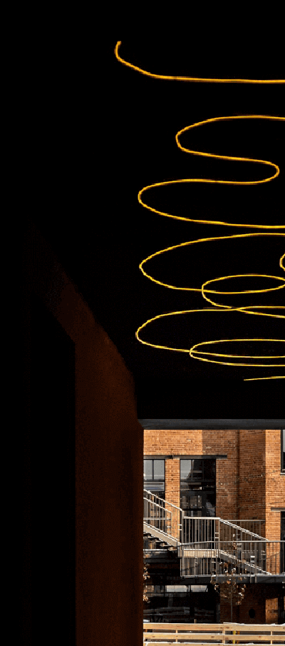 commercial led strip creates contrast in an alleyway to high-end venue.