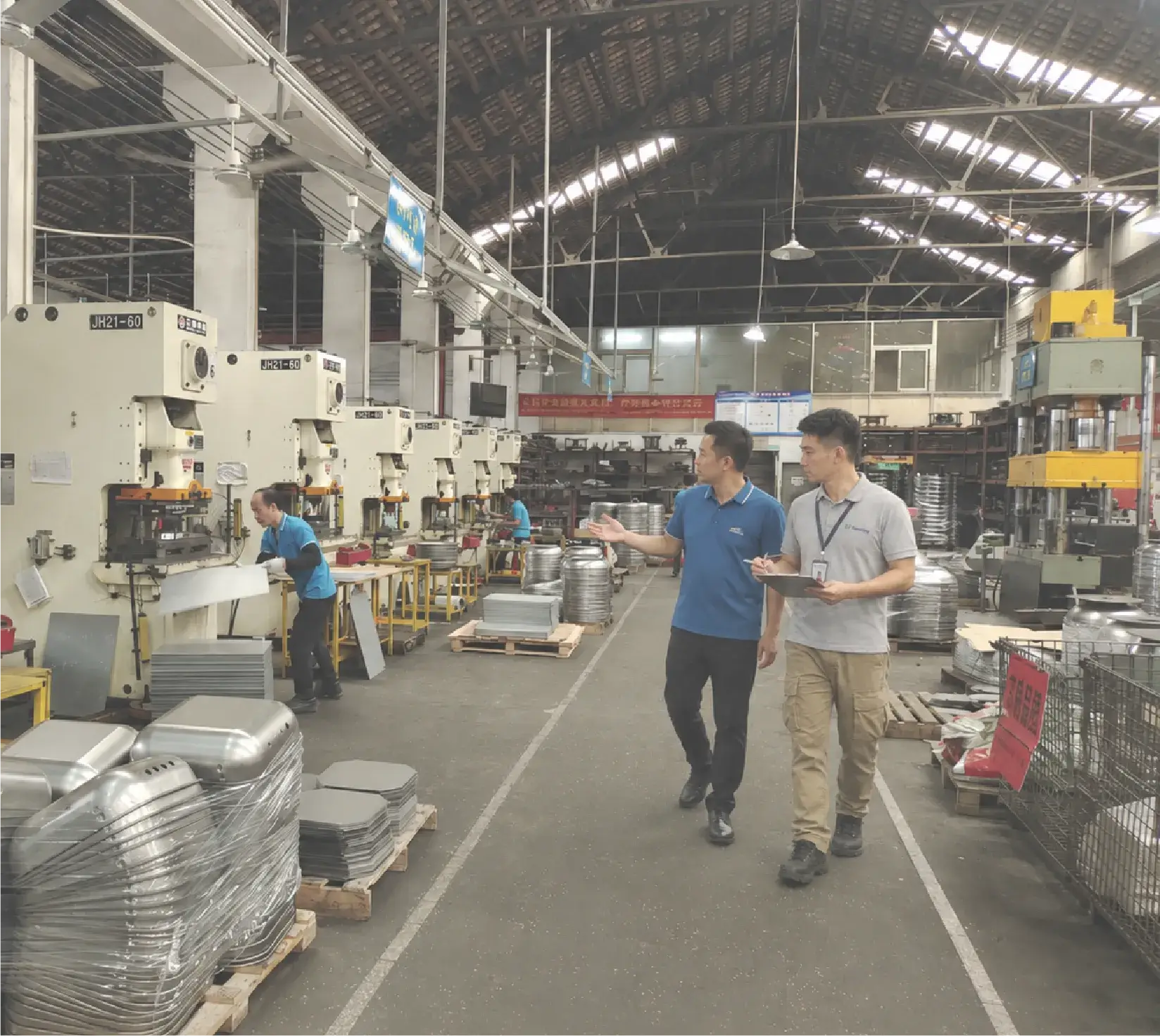 JS Sourcing staff   export cartons in a Chinese warehouse during an ongoing supplier review